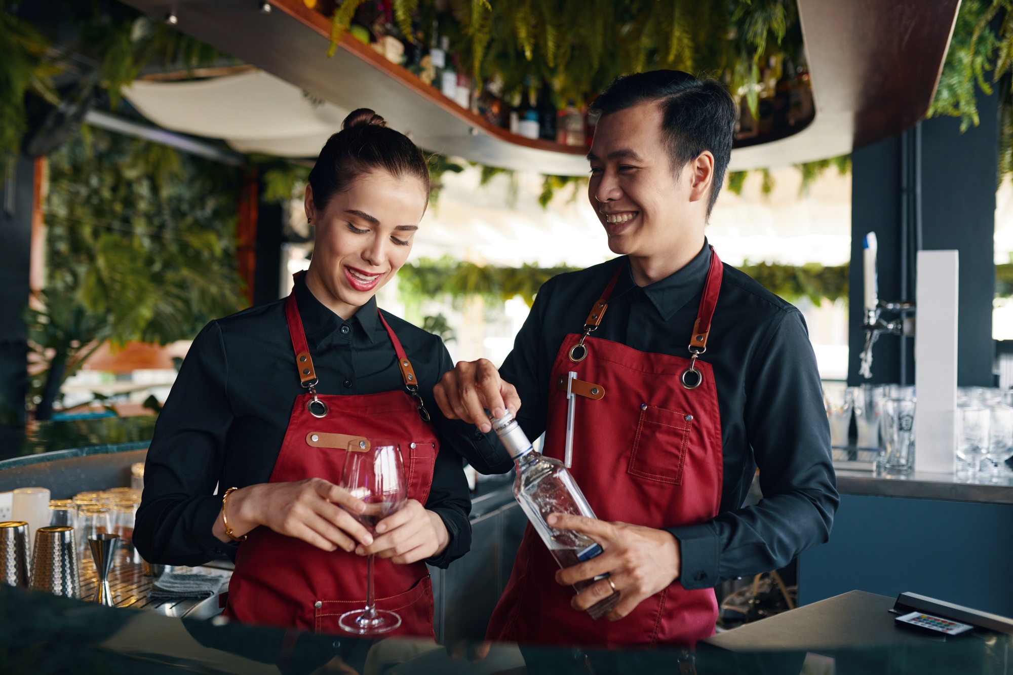Bartenders Making Alcohol Drinks